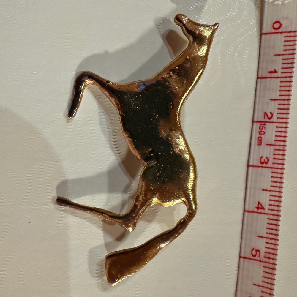 Elegant Gold Horse Brooch